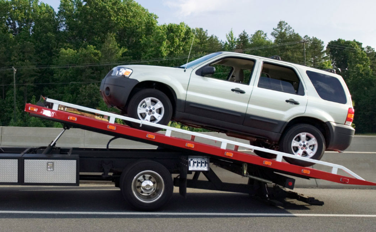 Towing services assisting a disabled vehicle in Houston TX